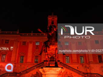 The facade of the Palazzo Senatorio of the Campidoglio in Rome, seat of the municipal administration, is lit up in red on the occasion of th...