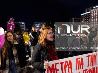 A protester shouts slogans during a rally in front of the Greek Parliament to mark the International Day for the Elimination of Violence aga...