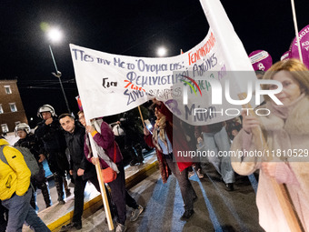 Protesters take part in a rally in front of the Greek Parliament to mark the International Day for the Elimination of Violence against Women...