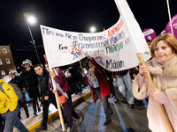 Protesters take part in a rally in front of the Greek Parliament to mark the International Day for the Elimination of Violence against Women...