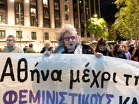 A protester shouts slogans during a rally in front of the Greek Parliament to mark the International Day for the Elimination of Violence aga...