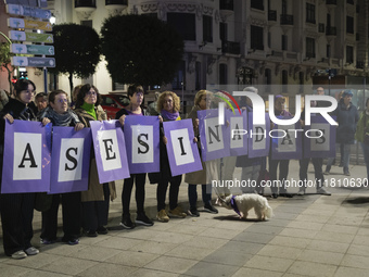 A group of women with signs reading ''murdered'' take part in the demonstration for the International Day for the Elimination of Violence ag...