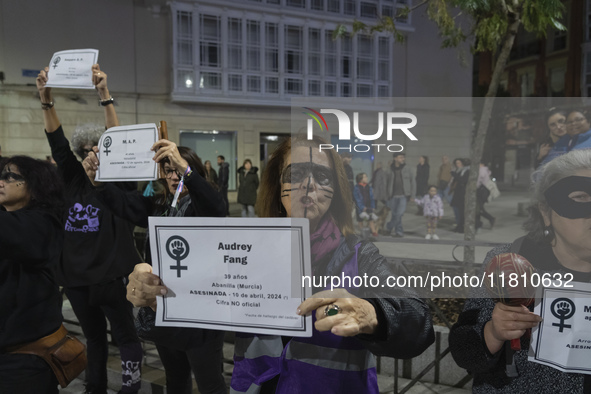 Women carry obituaries of women killed during the demonstration for the International Day for the Elimination of Violence against Women in t...