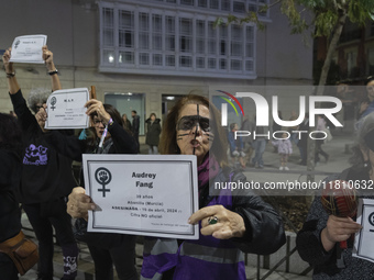 Women carry obituaries of women killed during the demonstration for the International Day for the Elimination of Violence against Women in t...