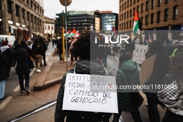 Demonstrators participate in a pro-Palestinian protest in Piazza Duomo in Milan, Italy, on November 23, 2024 