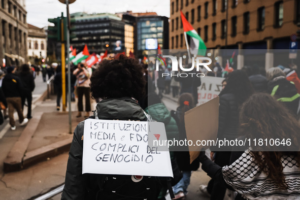 Demonstrators participate in a pro-Palestinian protest in Piazza Duomo in Milan, Italy, on November 23, 2024 