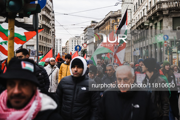 Demonstrators participate in a pro-Palestinian protest in Piazza Duomo in Milan, Italy, on November 23, 2024 