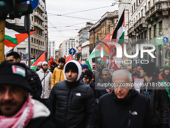 Demonstrators participate in a pro-Palestinian protest in Piazza Duomo in Milan, Italy, on November 23, 2024 (