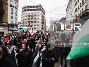 Demonstrators participate in a pro-Palestinian protest in Piazza Duomo in Milan, Italy, on November 23, 2024 (