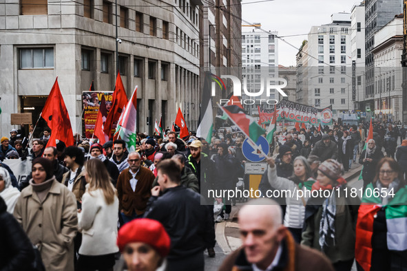 Demonstrators participate in a pro-Palestinian protest in Piazza Duomo in Milan, Italy, on November 23, 2024 