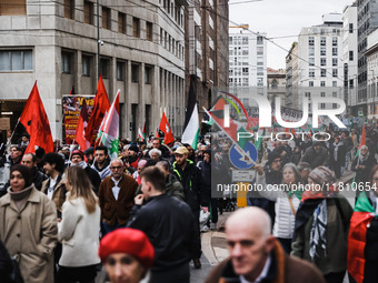 Demonstrators participate in a pro-Palestinian protest in Piazza Duomo in Milan, Italy, on November 23, 2024 (