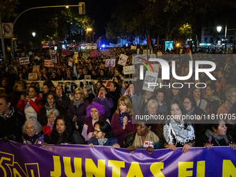 Thousands of people take to the streets of Madrid, Spain, on November 25, 2024, during the demonstration organized by the 8M Commission on t...