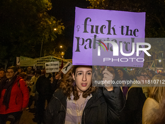 Thousands of people take to the streets of Madrid, Spain, on November 25, 2024, during the demonstration organized by the 8M Commission on t...