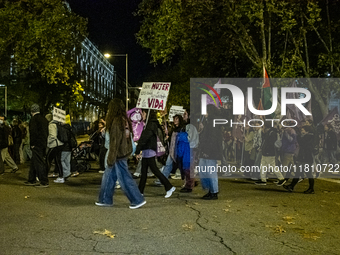 Thousands of people take to the streets of Madrid, Spain, on November 25, 2024, during the demonstration organized by the 8M Commission on t...