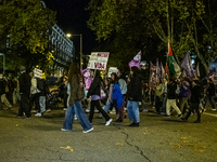 Thousands of people take to the streets of Madrid, Spain, on November 25, 2024, during the demonstration organized by the 8M Commission on t...