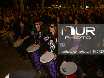 Thousands of people take to the streets of Madrid, Spain, on November 25, 2024, during the demonstration organized by the 8M Commission on t...