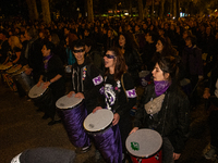 Thousands of people take to the streets of Madrid, Spain, on November 25, 2024, during the demonstration organized by the 8M Commission on t...