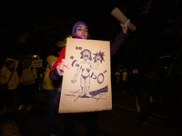 Thousands of people take to the streets of Madrid, Spain, on November 25, 2024, during the demonstration organized by the 8M Commission on t...