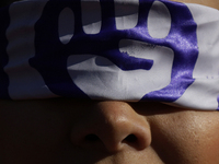 A woman protests in Mexico City, Mexico, on November 25, 2024, on the occasion of the International Day for the Elimination of Violence agai...