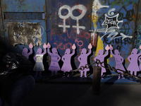 Silhouettes placed by mothers, relatives of missing persons and victims of femicide, feminist collectives, and various organizations are see...