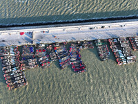 Fishing boats berth in the harbor to take shelter from the cold wave and wind at the central fishing port of Liandao in Lianyungang, Jiangsu...