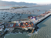 Fishing boats berth in the harbor to take shelter from the cold wave and wind at the central fishing port of Liandao in Lianyungang, Jiangsu...