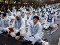 Members of the Korea Parents' Network for People with Disabilities stage the first day of their hunger strike in front of the National Assem...