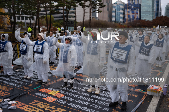 Members of the Korea Parents' Network for People with Disabilities stage the first day of their hunger strike in front of the National Assem...