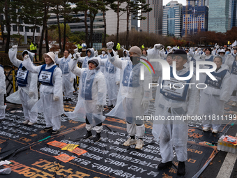 Members of the Korea Parents' Network for People with Disabilities stage the first day of their hunger strike in front of the National Assem...