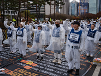 Members of the Korea Parents' Network for People with Disabilities stage the first day of their hunger strike in front of the National Assem...