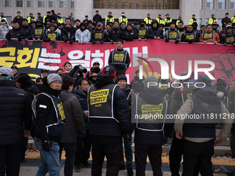 Over 100 members of the Cargo Truckers' Solidarity Division under the Korean Confederation of Trade Unions Public Transport Workers' Union s...