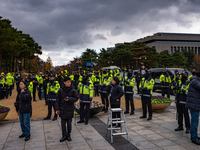 Over 100 members of the Cargo Truckers' Solidarity Division under the Korean Confederation of Trade Unions Public Transport Workers' Union s...