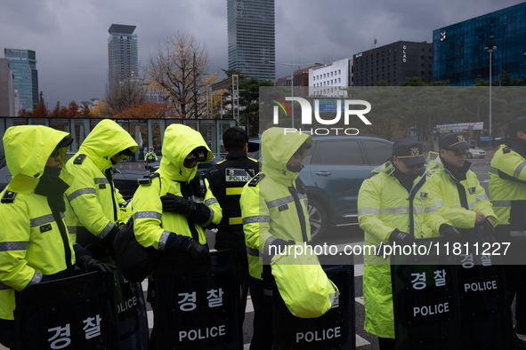 Over 100 members of the Cargo Truckers' Solidarity Division under the Korean Confederation of Trade Unions Public Transport Workers' Union s...