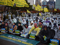 Hundreds of participants gather in front of the National Assembly in Yeouido, in Seoul, South Korea, on November 26, 2024, to demand increas...