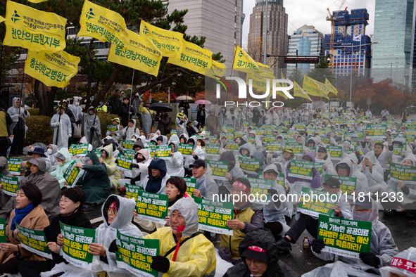 Hundreds of participants gather in front of the National Assembly in Yeouido, in Seoul, South Korea, on November 26, 2024, to demand increas...