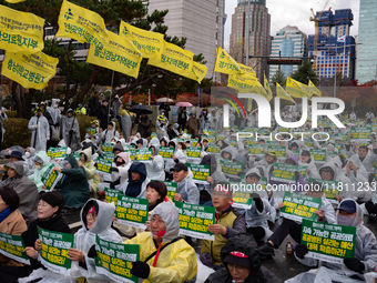 Hundreds of participants gather in front of the National Assembly in Yeouido, in Seoul, South Korea, on November 26, 2024, to demand increas...