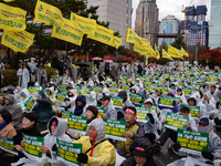 Hundreds of participants gather in front of the National Assembly in Yeouido, in Seoul, South Korea, on November 26, 2024, to demand increas...