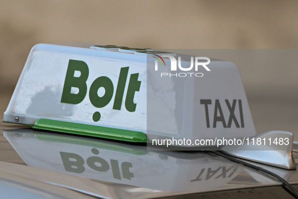 KRAKOW, POLAND - NOVEMBER 21:   
Bolt taxi sign is seen on a car, on November 21, 2024 in Krakow, Poland. 