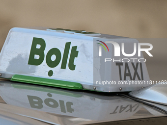 KRAKOW, POLAND - NOVEMBER 21:   
Bolt taxi sign is seen on a car, on November 21, 2024 in Krakow, Poland. (