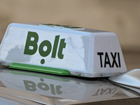 KRAKOW, POLAND - NOVEMBER 21:   
Bolt taxi sign is seen on a car, on November 21, 2024 in Krakow, Poland. (