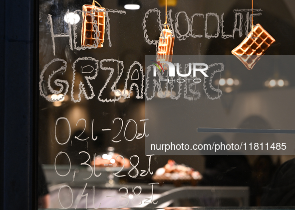 KRAKOW, POLAND - NOVEMBER 21:   
A restaurant window displays the prices for hot chocolate and hot wine, in Krakow's Old Town, on November 2...