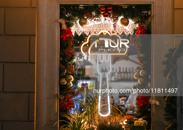 KRAKOW, POLAND - NOVEMBER 21:   
A sign in the window of Pierogarnia 'Krakowiacy,' specializing in traditional Polish handmade dumplings, on...