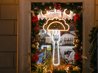 KRAKOW, POLAND - NOVEMBER 21:   
A sign in the window of Pierogarnia 'Krakowiacy,' specializing in traditional Polish handmade dumplings, on...