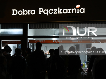 KRAKOW, POLAND - NOVEMBER 21:   
A crowd gathered outside 'Dobra Paczkarnia' shop in Krakow's Old Town, on November 21, 2024 in Krakow, Pola...