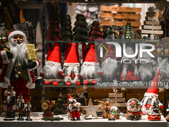 KRAKOW, POLAND - NOVEMBER 21:   
A shop window displaying Christmas-themed objects and decorations, on November 21, 2024 in Krakow, Poland....