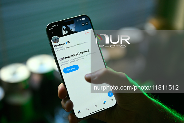 Elon Musk's profile is seen blocked on the X, formerly known as Twitter application in this illustration photo taken in Warsaw, Poland on 26...