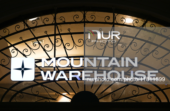 KRAKOW, POLAND - NOVEMBER 21:   
The Mountain Warehouse logo displayed on a store facade, on November 21, 2024 in Krakow, Poland. 