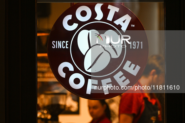 KRAKOW, POLAND - NOVEMBER 21:   
The Costa Coffee logo displayed on a cafe storefront, on November 21, 2024 in Krakow, Poland. 