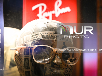 KRAKOW, POLAND - NOVEMBER 21:   
Ray-Ban glasses displayed on a mannequin in the Ray-Ban shop window, on November 21, 2024 in Krakow, Poland...