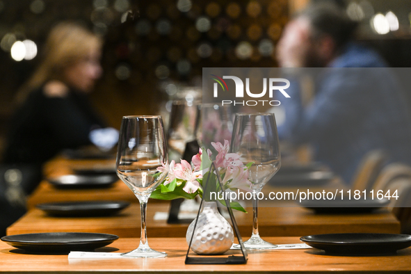 KRAKOW, POLAND - NOVEMBER 21:   
Empty tables waiting for tourists inside a nearly empty restaurant in Krakow's Main Square, on November 21,...